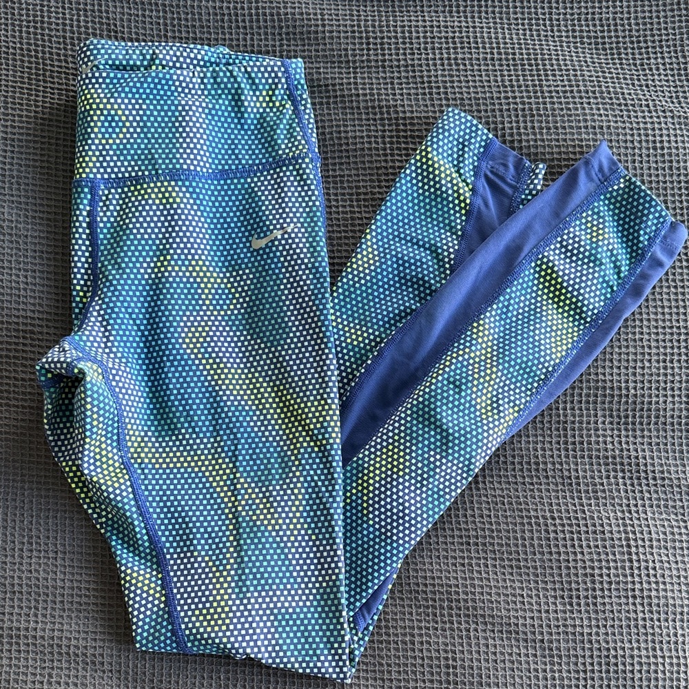 Nike Dri-Fit running tights with mesh paneling
